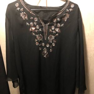 Black flowy blouse with embroidered neckline